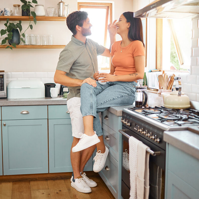 Image of new homeowners in their kitchen