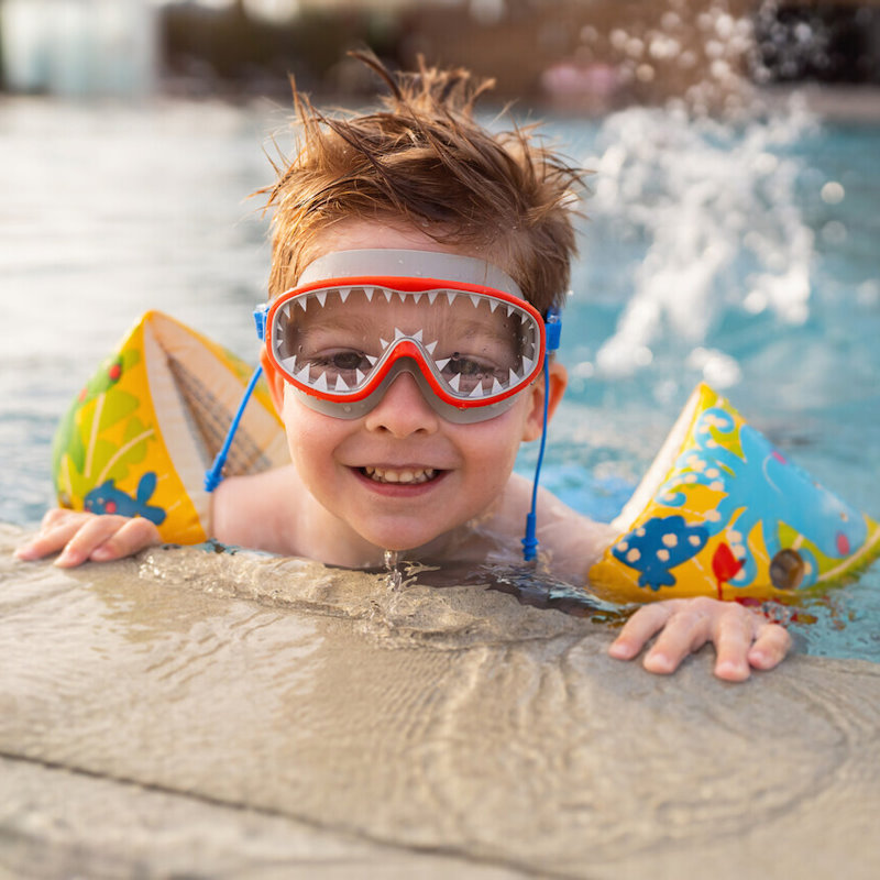Image of a child swimming in a pool