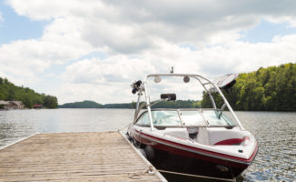 Boat docked in a lake